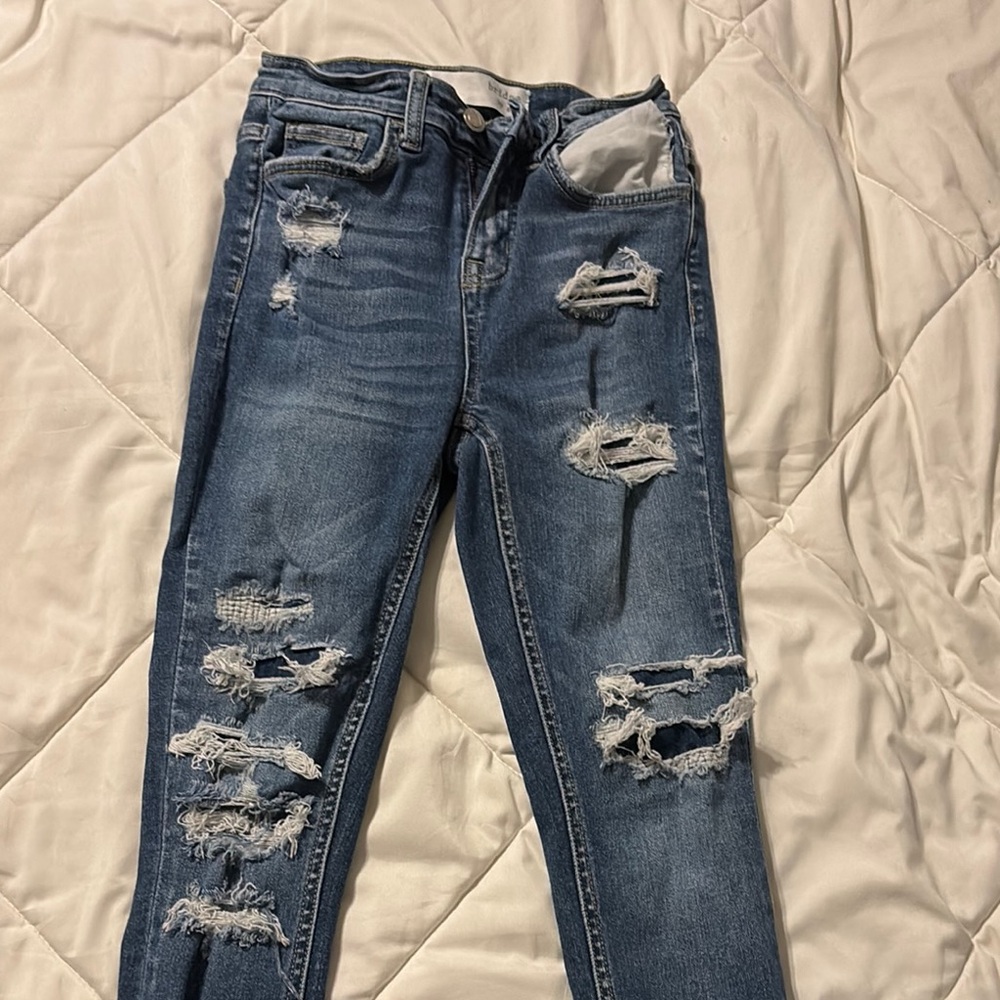 Distressed Blue Jeans